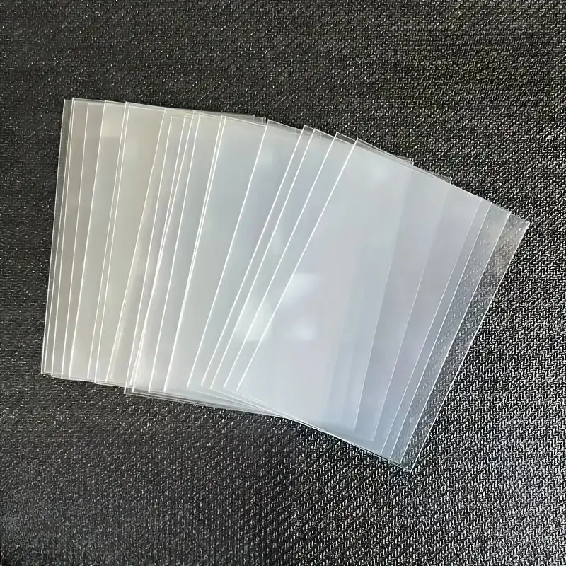 300/100Pcs 66*91mm Card Sleeve - Card Sleeves Protector recension och pris